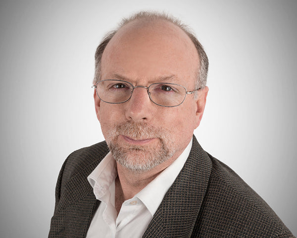 Corporate headshot of Chris Lasswell