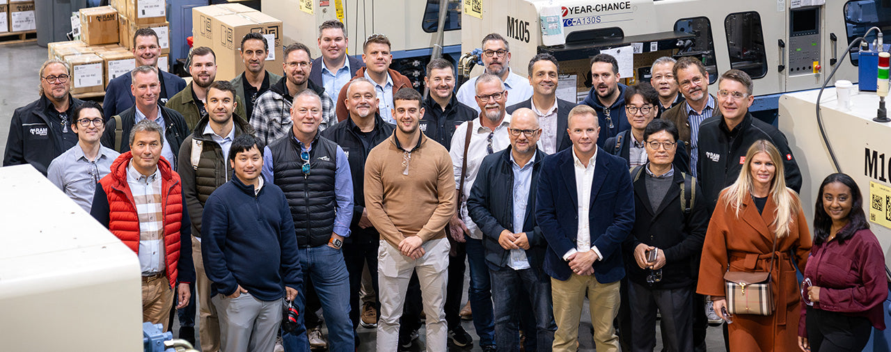 Group photo of people in RAM® Mounts plastic injection facility.