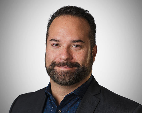 Corporate headshot of Donnie Hann