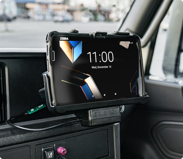 In use image of a Zebra ET401 device in a GDS Tech powered dock in a vehicle. 