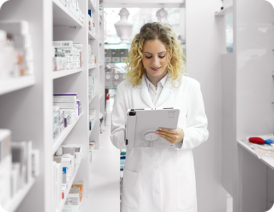 Pharmacist using a tablet