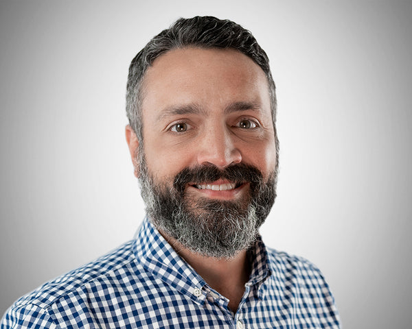 Corporate headshot of Jake Parker