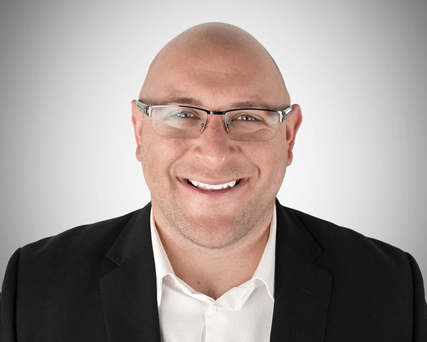 Corporate headshot of Kyle Lonzak