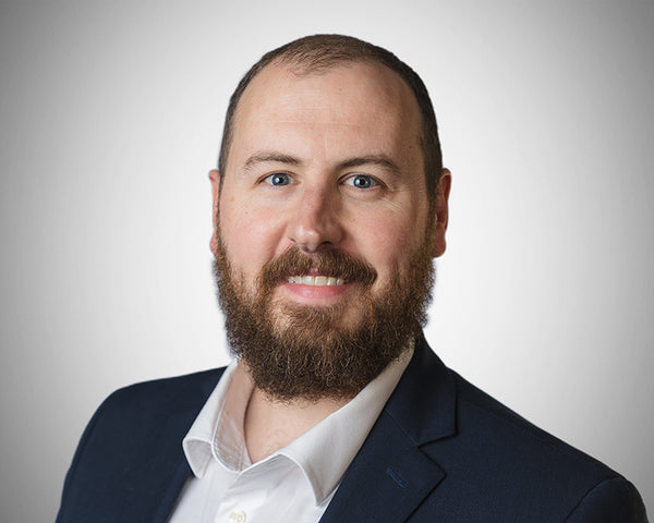 Corporate headshot of Matt Hughes