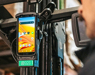 Image of the Zebra TC22 handheld PC with RAM Mounts' GDS Tech Vehicle Dock in a forklift