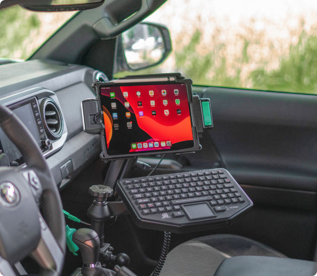 Image of an iPad Pro in an IntelliSkin® docked in a GDS Tech laptop replacement kit for cars and trucks