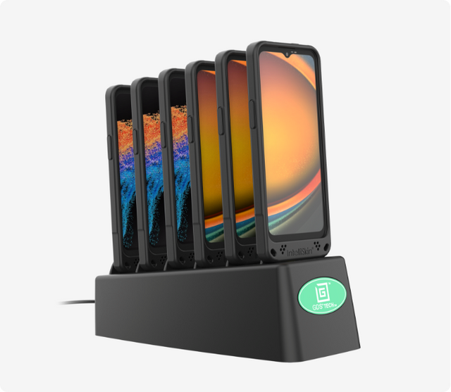 6 Xcover6 and Xcover7 phones charge in a GDS® 6-Port Power Delivery Desktop Charger for IntelliSkin® Next Gen