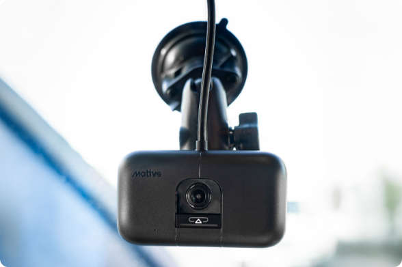 in use image of a motive dashcam mounted to a windshield using a ram suction cup mount